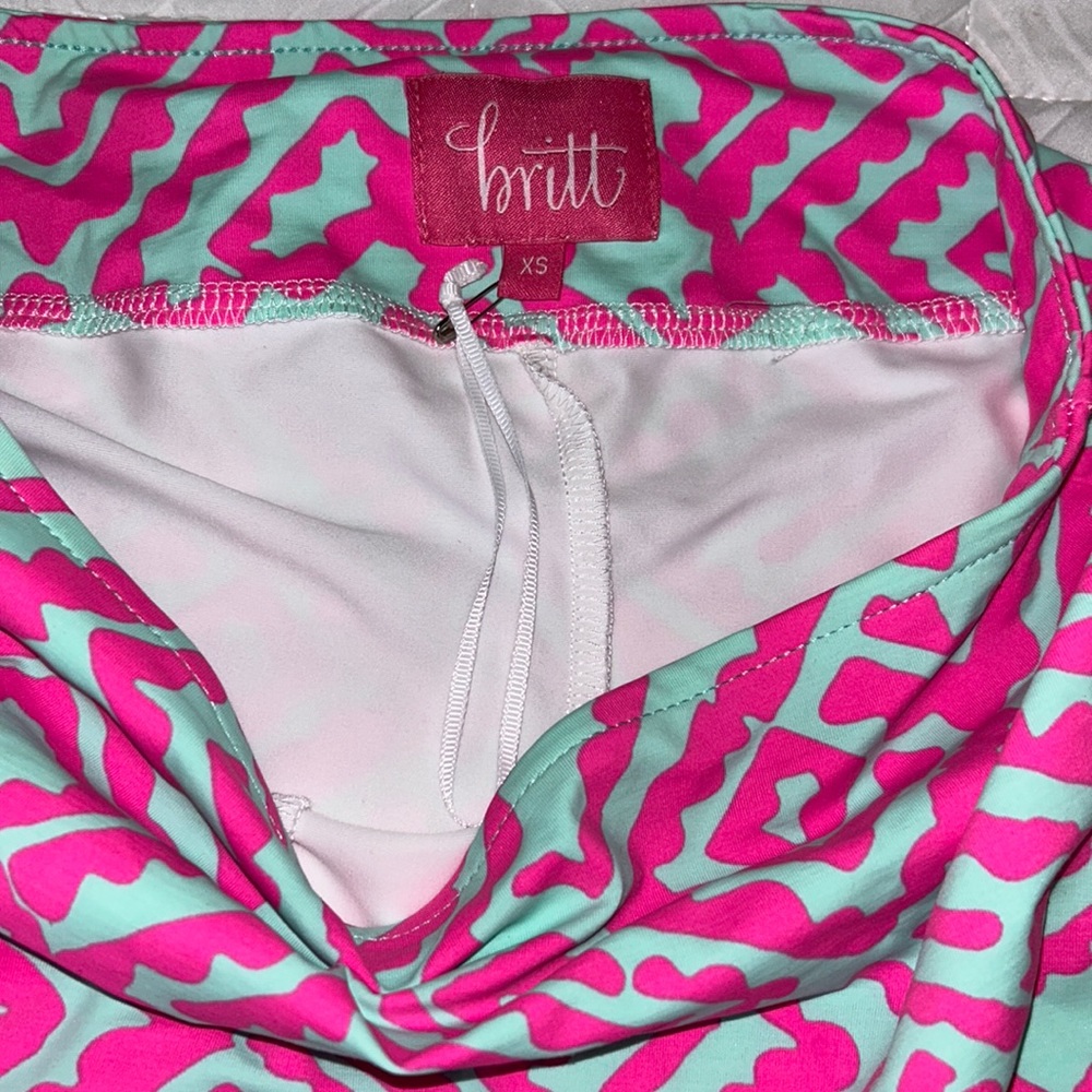 Designer, tennis skirt with shorts inside. Brand new without tags size XS